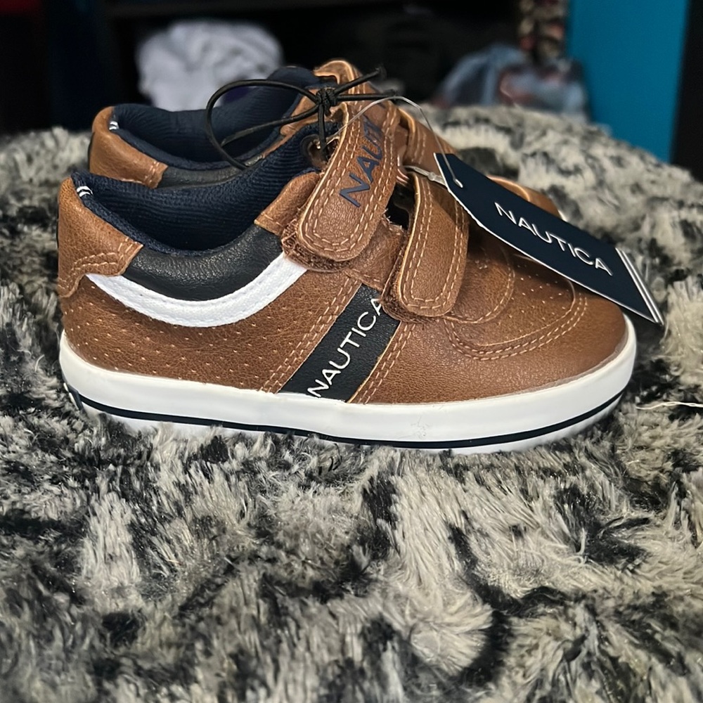 Brand new, never worn. Nautica sneakers